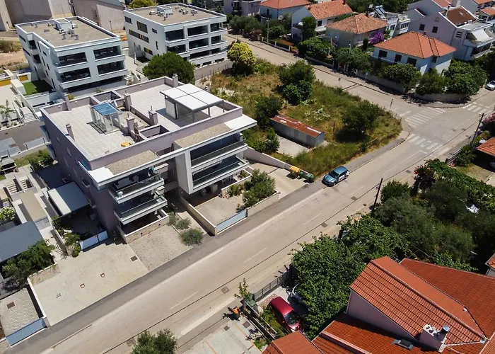 Wing 77 By Belmont Realty *