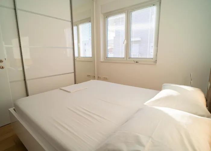 Wing 77 By Belmont Realty *