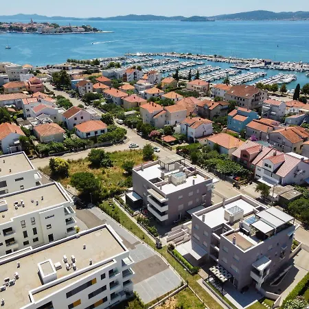 Wing 77 By Belmont Realty