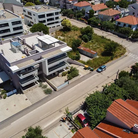 Wing 77 By Belmont Realty *